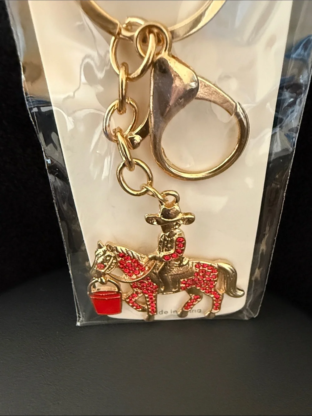 Gold-Tone Cowboy on Horse Keychain with Red Crystal Accents